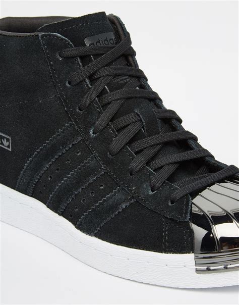 adidas superstar high top black.